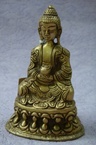 bouddha assis avec pot de medicin